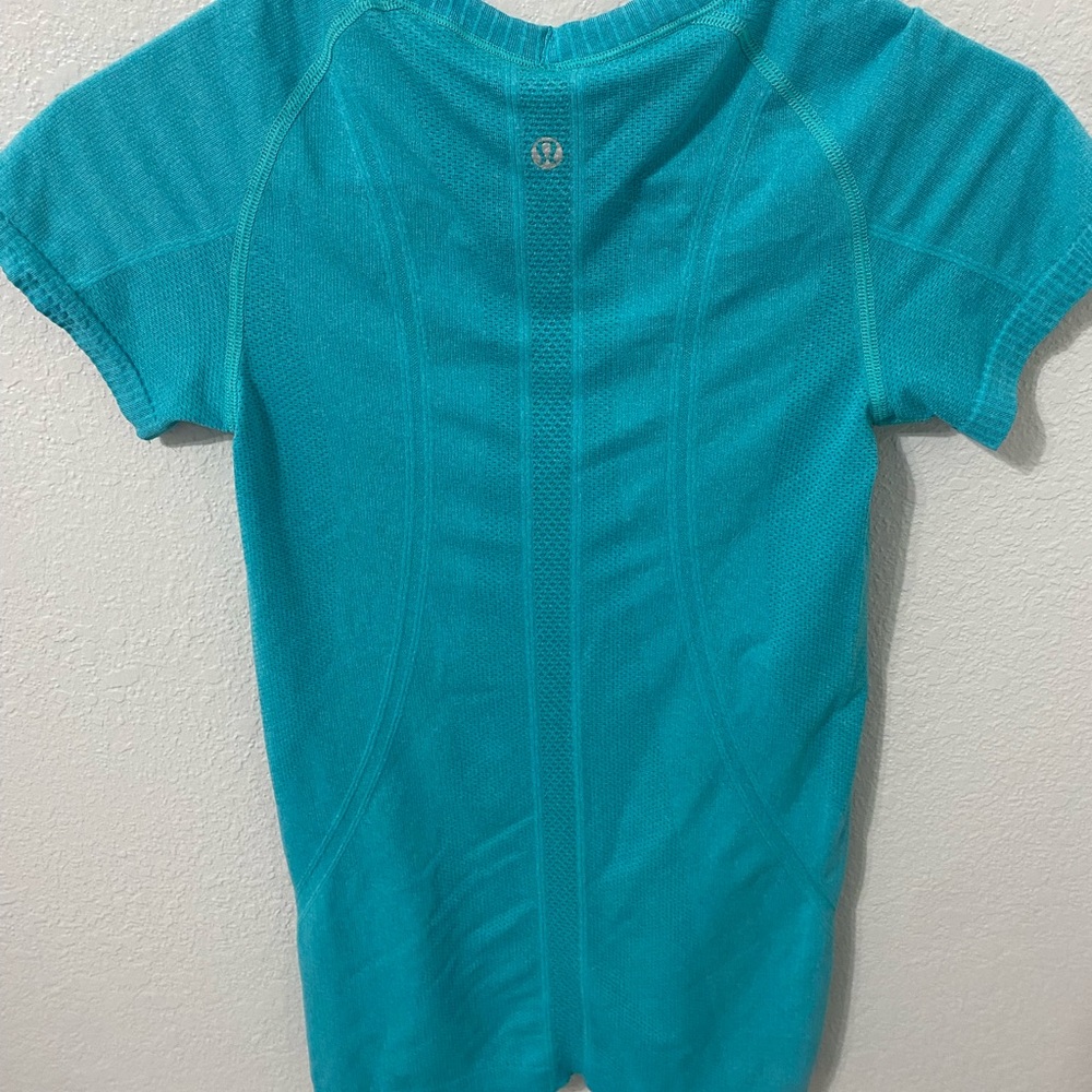 aqua lulu swiftly tech size 4